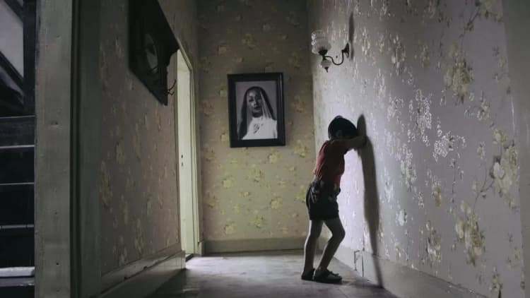 Satan's Slaves Poster